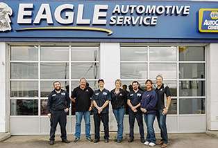 Staff infront of the shop | Eagle Automotive